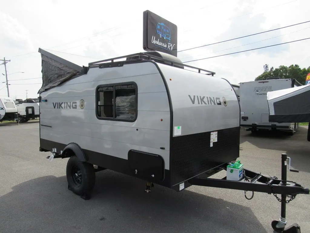 Side view of the New 2022 Coachmen Viking Express 12.0TD XL Pop Up Camper RV.