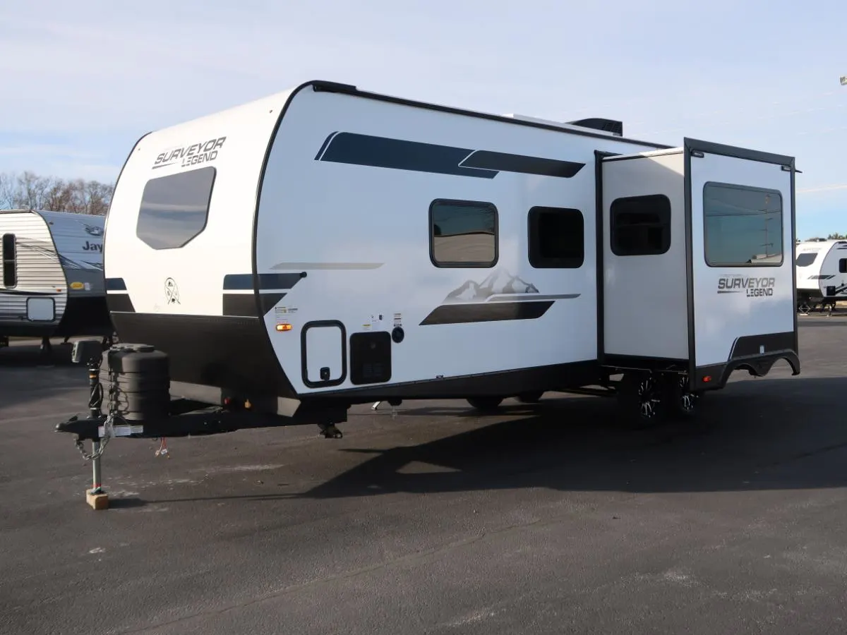 Side view of the New 2024 Forest River SURVEYOR LEGEND 252RBLE Travel Trailer RV.