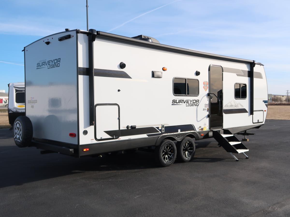 Side view of the New 2024 Forest River SURVEYOR LEGEND 252RBLE Travel Trailer RV.