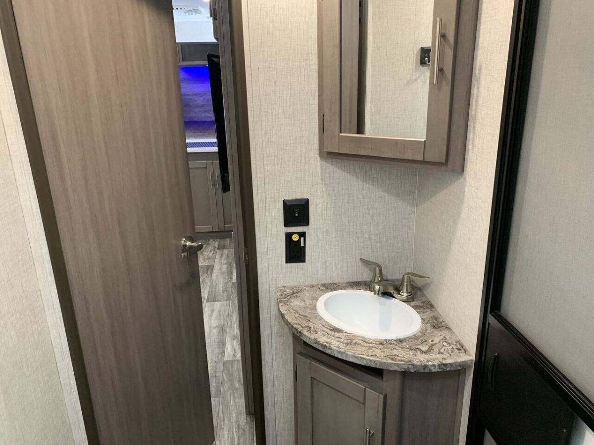 Bathroom with a sink and a medicine cabinet.