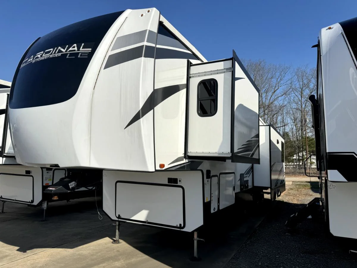 Side view of the RV with slide outs.