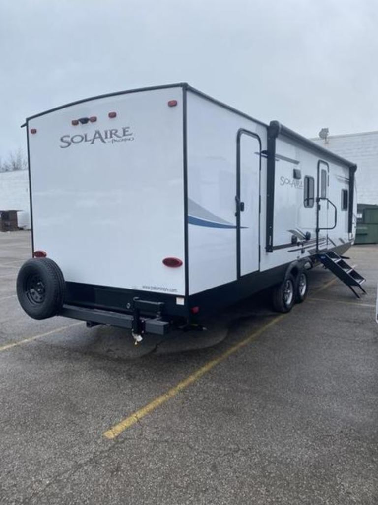 Rear view of the New 2022 Palomino SolAire Ultra Lite 294DBHS Travel Trailer RV.