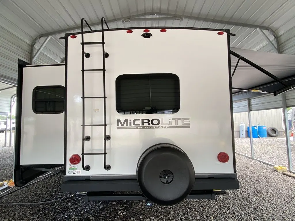 Rear view of the New 2024 Forest River Flagstaff Micro Lite 25FKBS Travel Trailer RV.