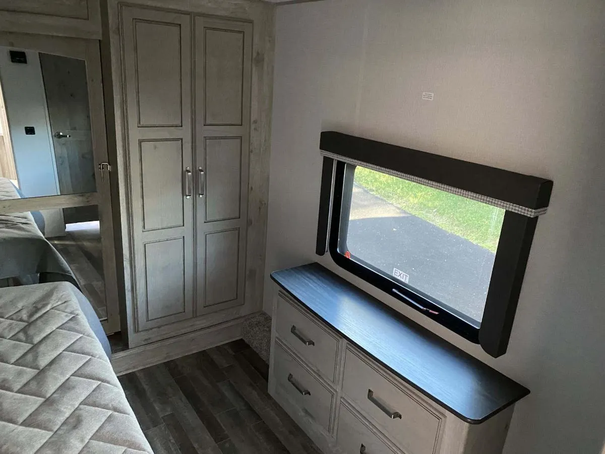 Bedroom with a dresser.