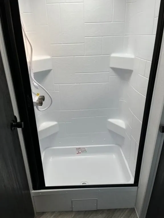 Bathroom with a walk-in shower.