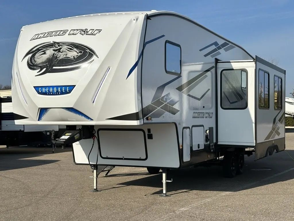 Side view of the New 2024 Forest River Arctic Wolf 287BH Fifth Wheel RV.