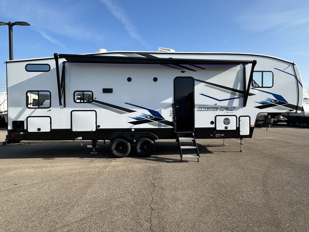 Side view of the New 2024 Forest River Arctic Wolf 287BH Fifth Wheel RV.