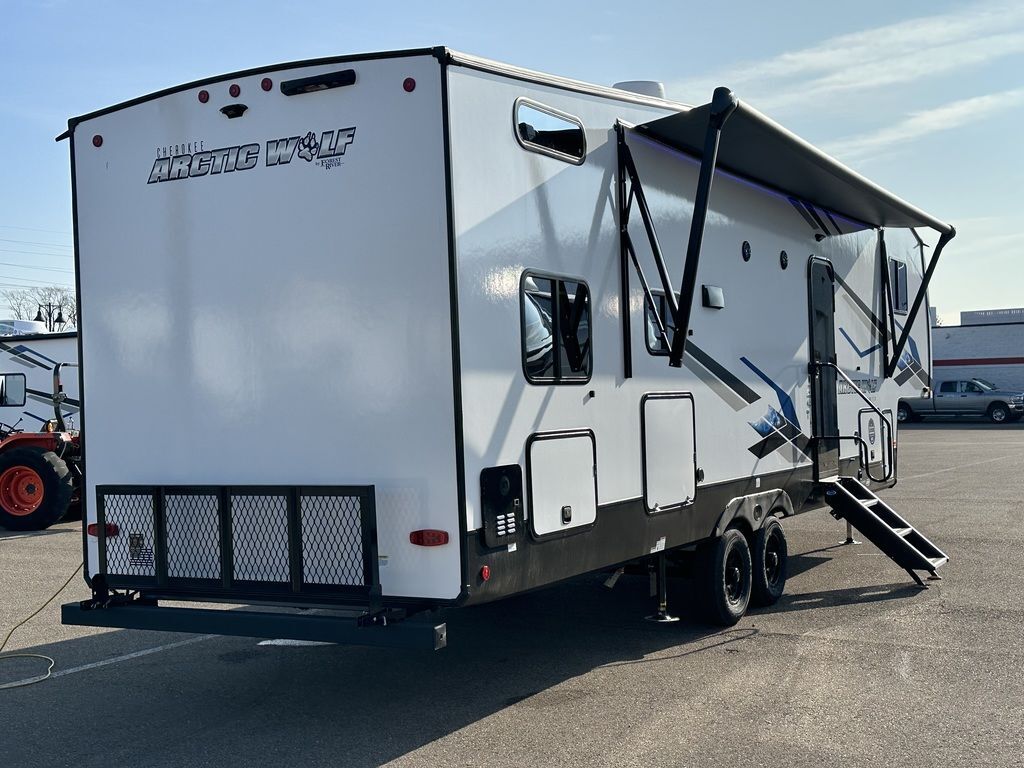 Side view of the New 2024 Forest River Arctic Wolf 287BH Fifth Wheel RV.