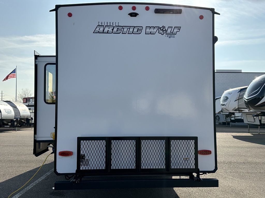 Rear view of the New 2024 Forest River Arctic Wolf 287BH Fifth Wheel RV.