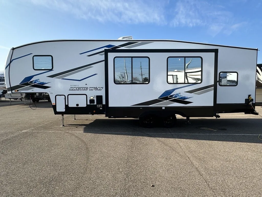 Side view of the New 2024 Forest River Arctic Wolf 287BH Fifth Wheel RV.