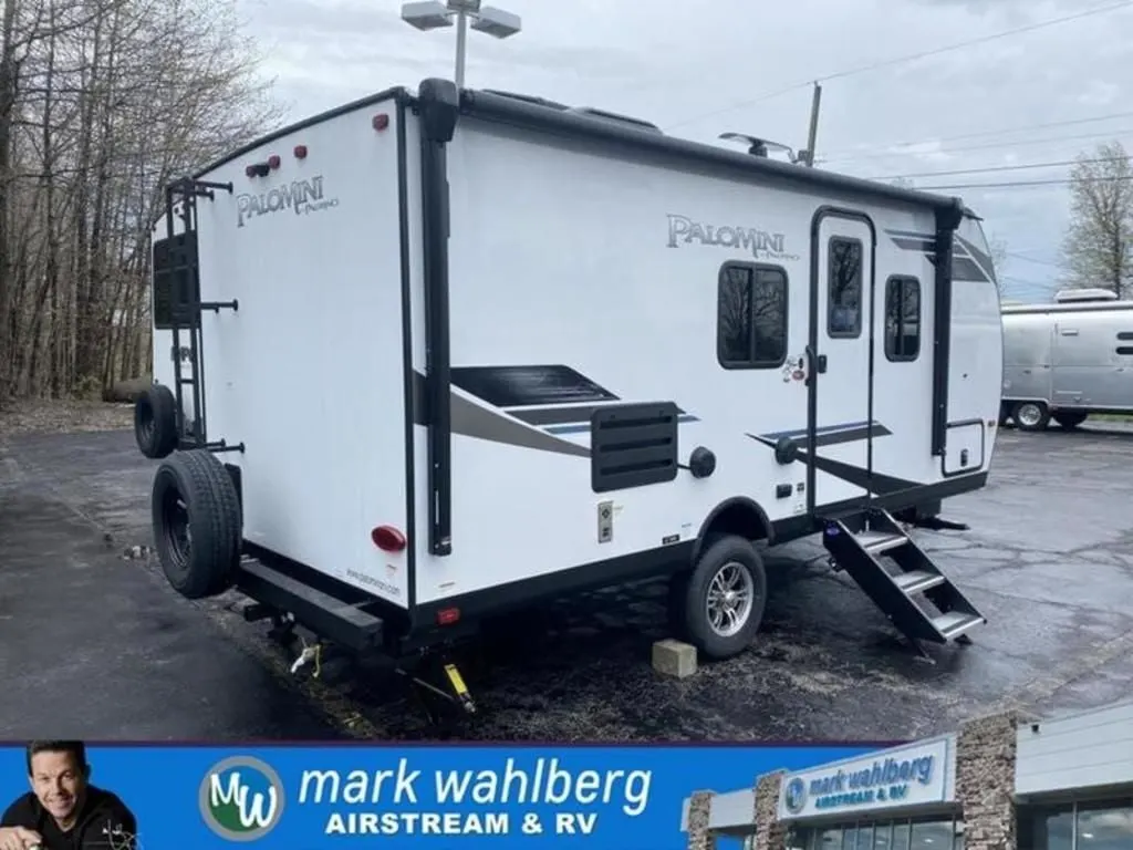 Side view of the New 2022 Palomino PaloMini 186RBS Travel Trailer RV.