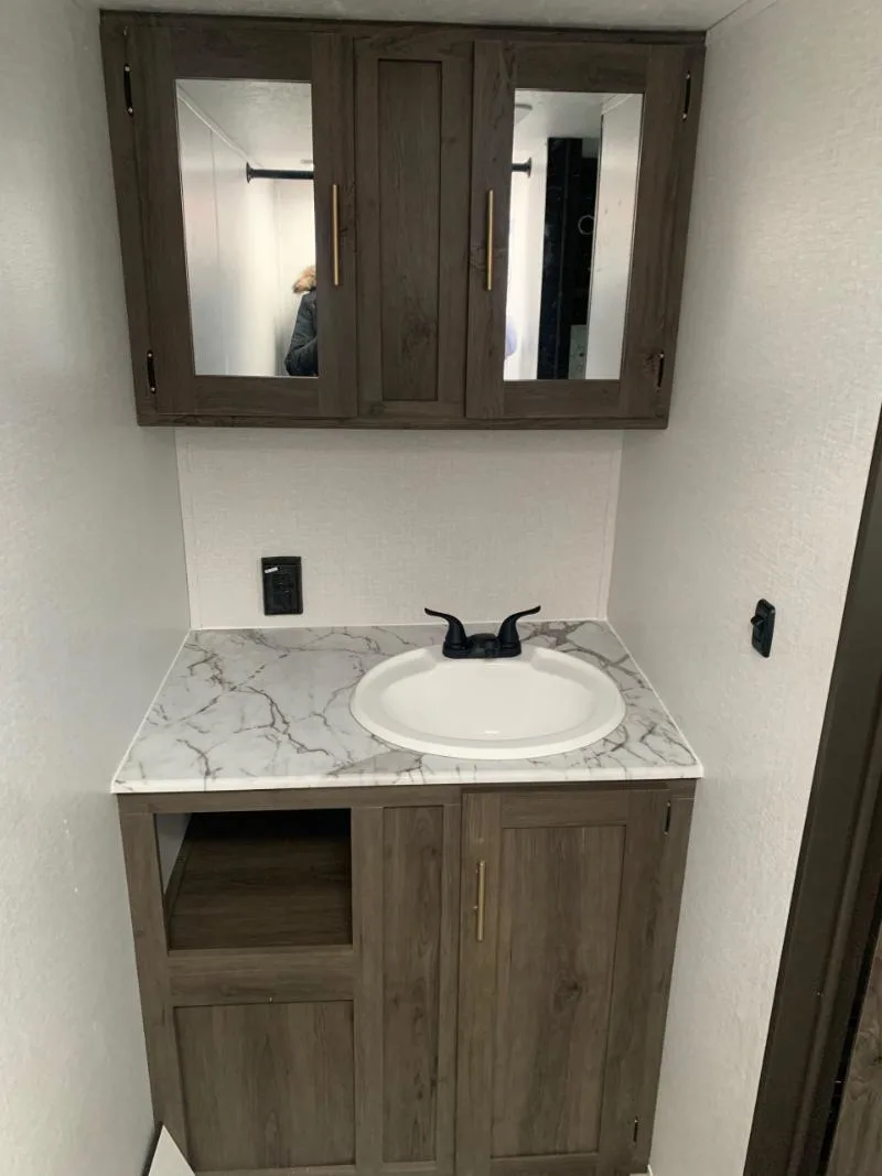 Bathroom with a sink and a medicine cabinet.