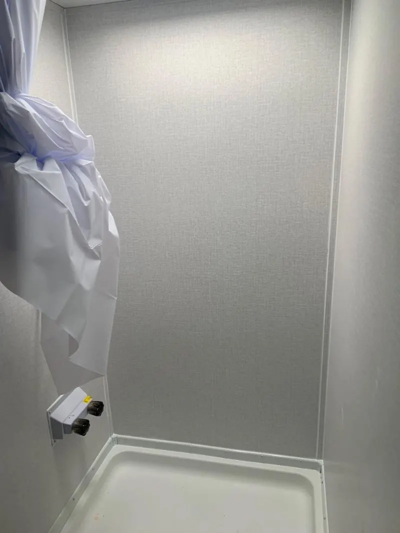 Bathroom with a walk-in shower.