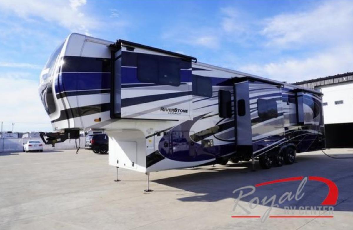 Side view of the New 2024 Forest River RV RiverStone 42FSKG Fifth Wheel Toy Hauler RV.