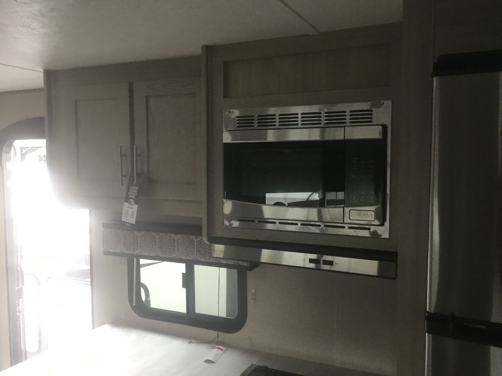 Kitchen with an oven and cabinets.