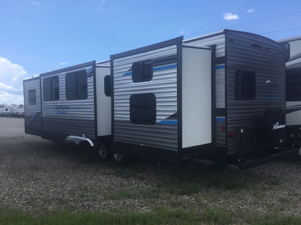 Side view of the New 2022 Coachmen Catalina Legacy Edition 343BHTS Travel Trailer RV.