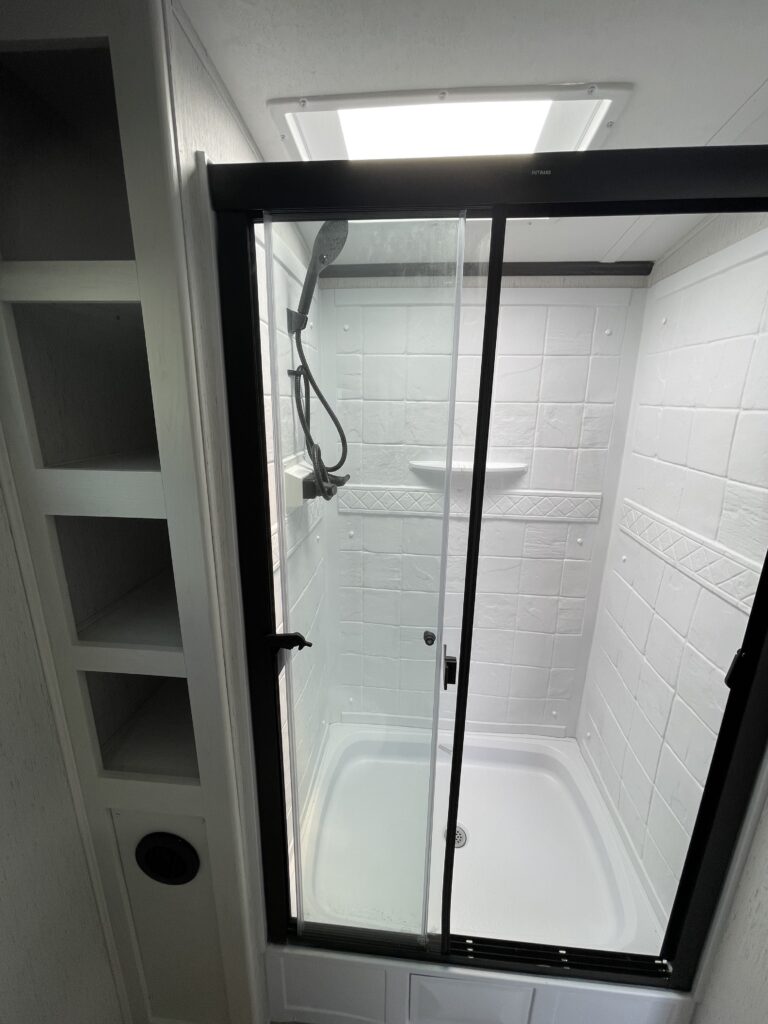 Bathroom with a walk-in shower.