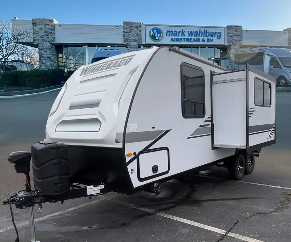 Side view of the RV with a slide out.