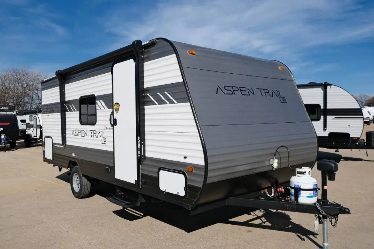 Side view of the 2022 Dutchmen Aspen Trail 1950BH Travel Trailer RV.