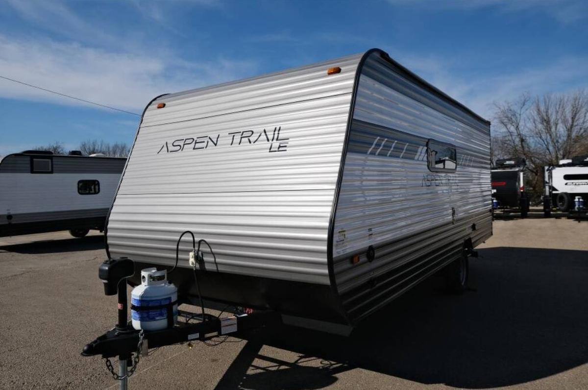 Side view of the 2022 Dutchmen Aspen Trail 1950BH Travel Trailer RV.