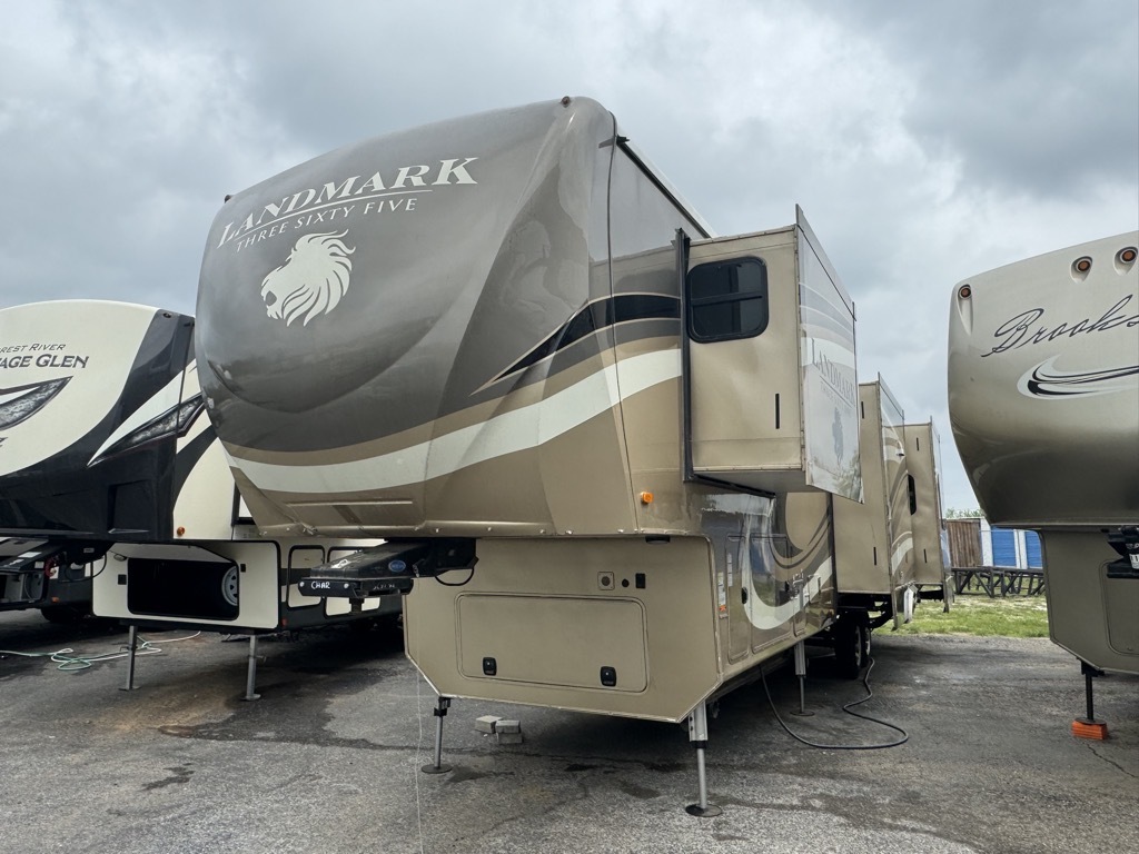 Side view of the RV with slide outs.