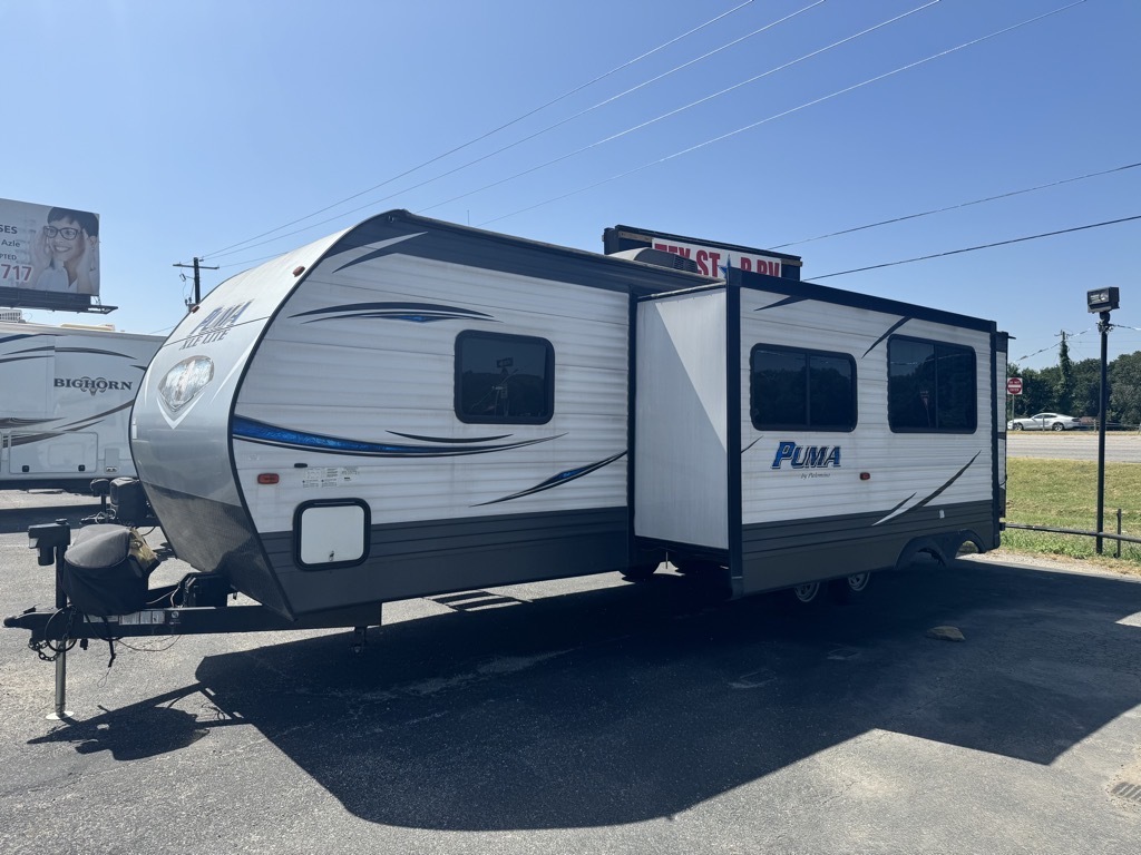 Side view of the RV with a slide out.