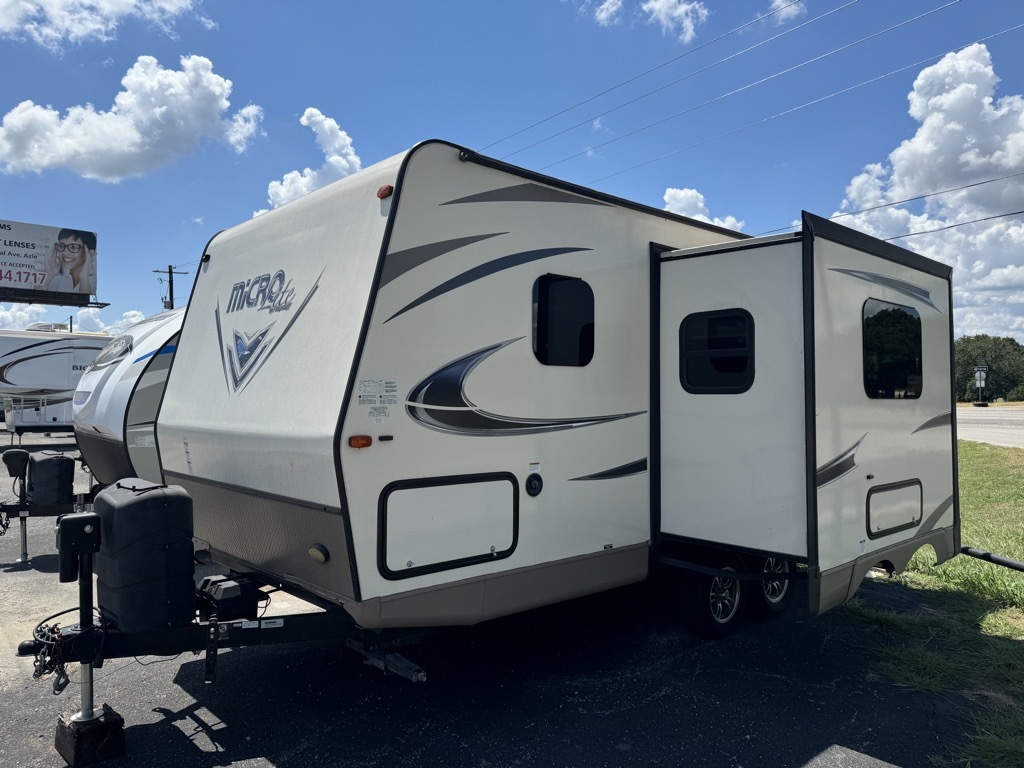 Side view of the RV with a slide out.