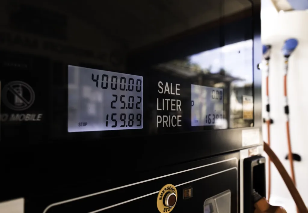 A close-up of a gas pump display showing the amount of fuel dispensed and the cost.