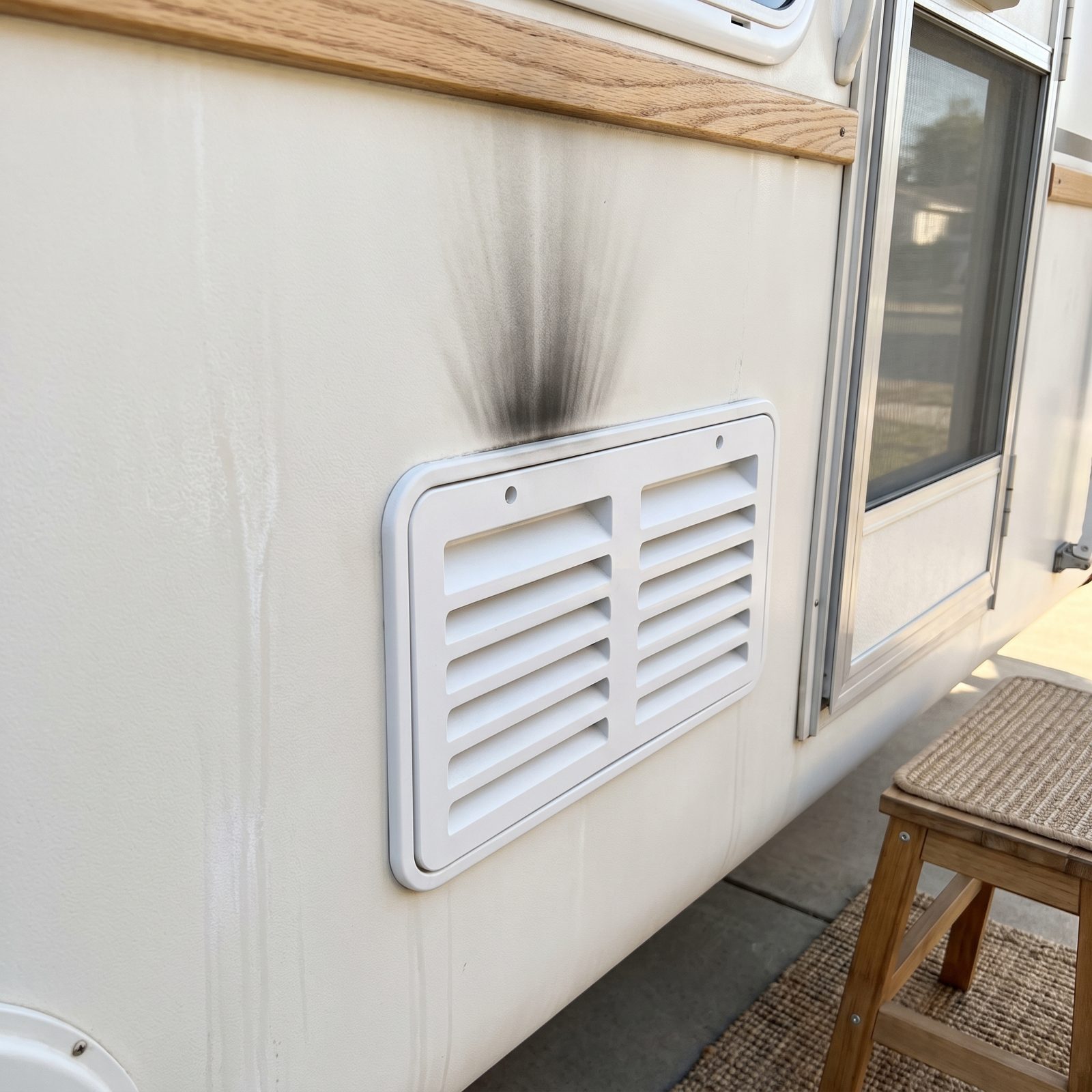 Black Soot Above an Appliance Vent