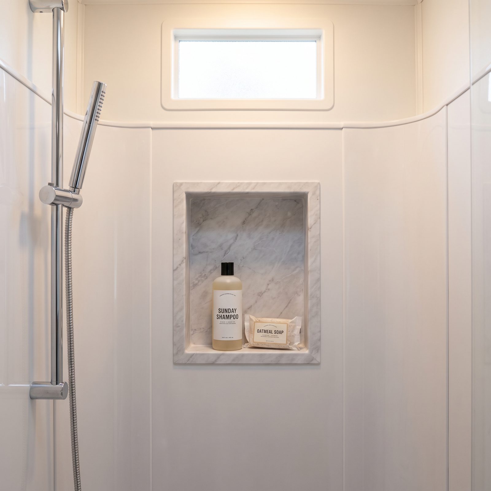 Build a shower niche instead of adding protruding caddies