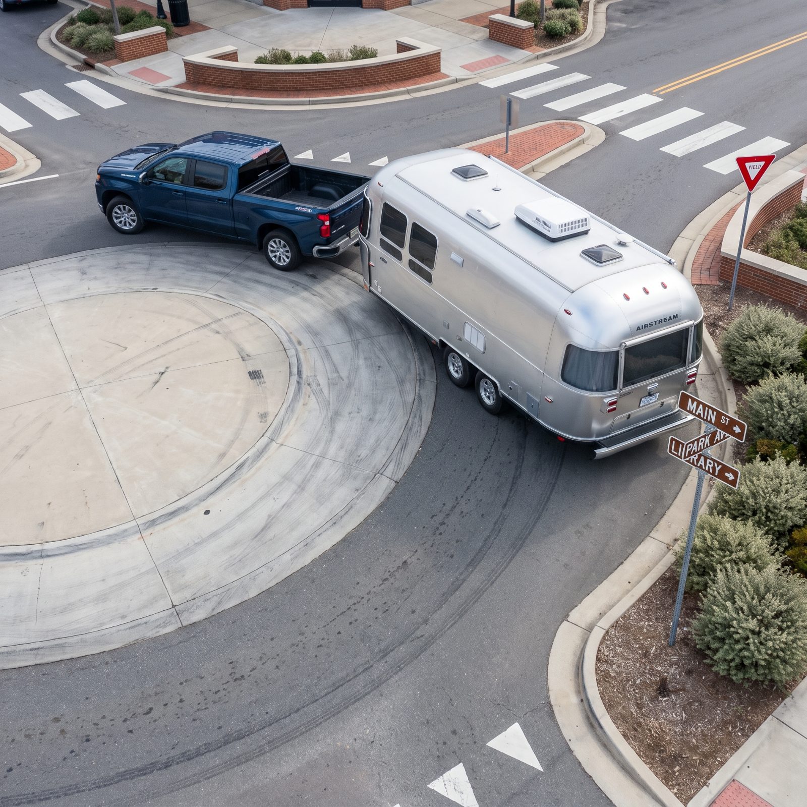 Compact Roundabouts Where the Trailer Climbs the Center Apron