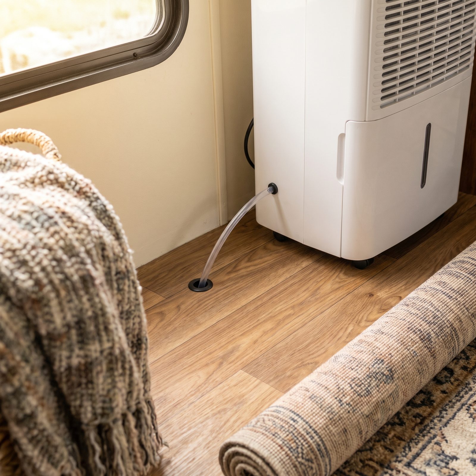 A Dehumidifier Drain Routed Straight Through the Floor