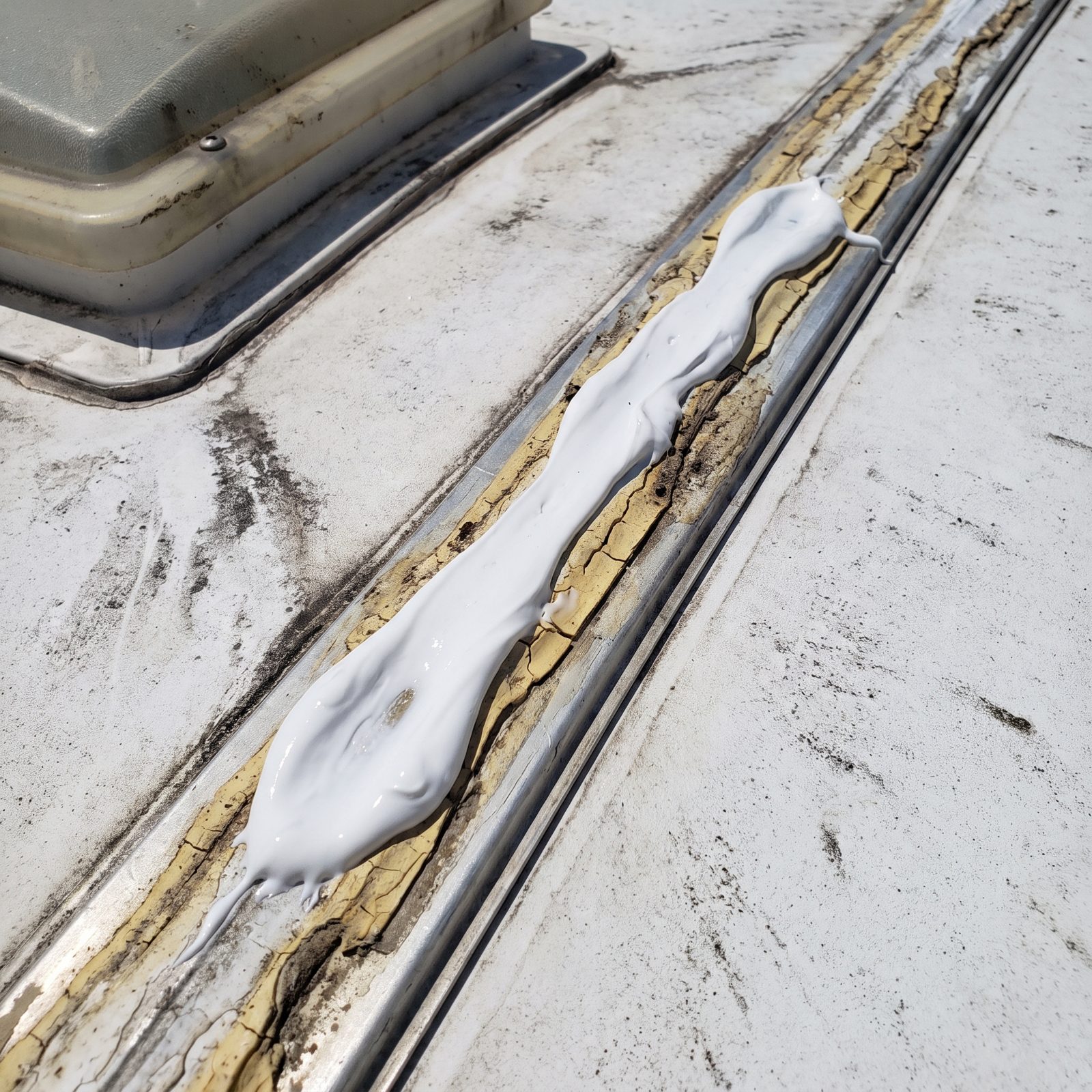 Globs of Fresh Sealant Hiding Older Roof Repairs