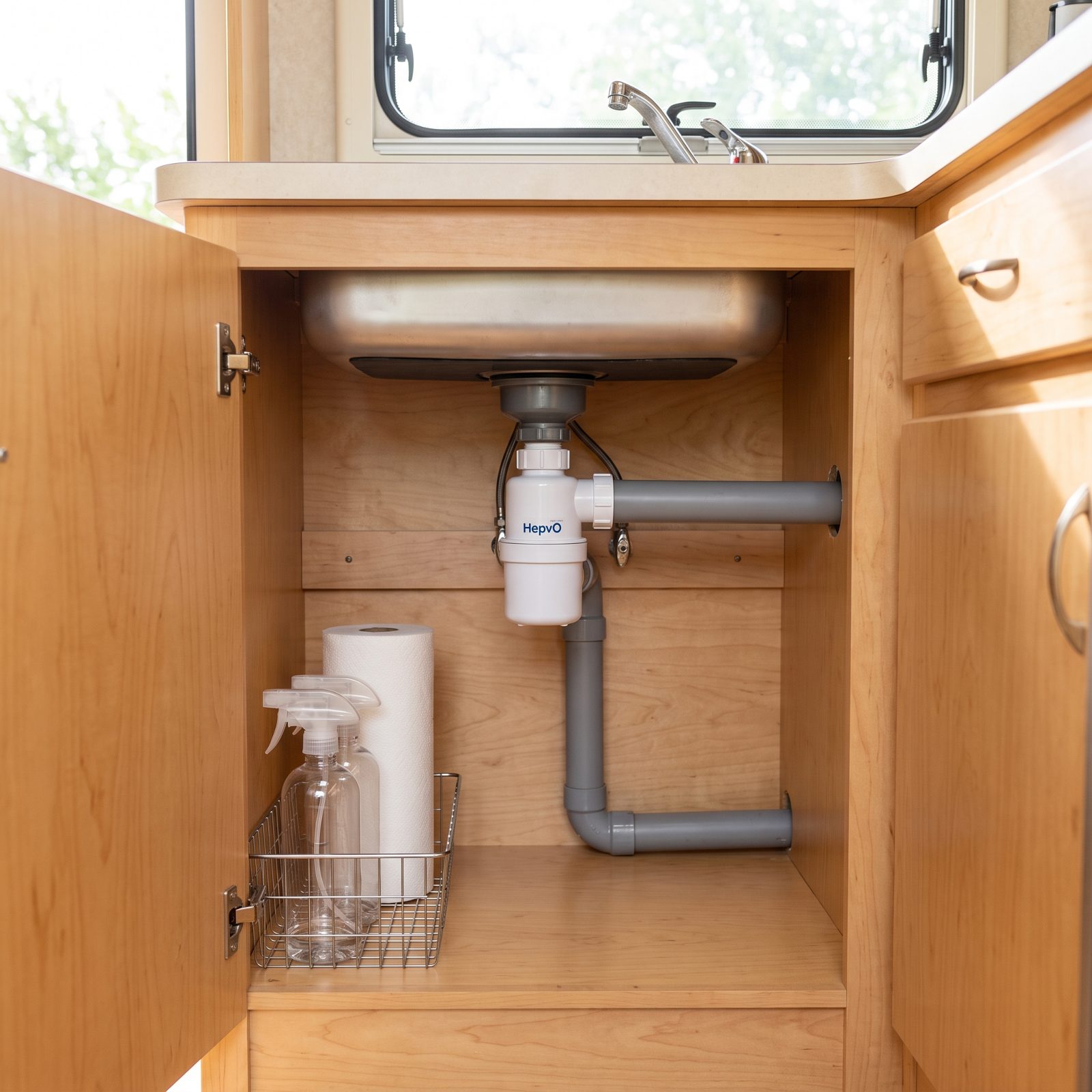 A HepvO Waterless Trap That Frees the Cabinet Beneath the Sink