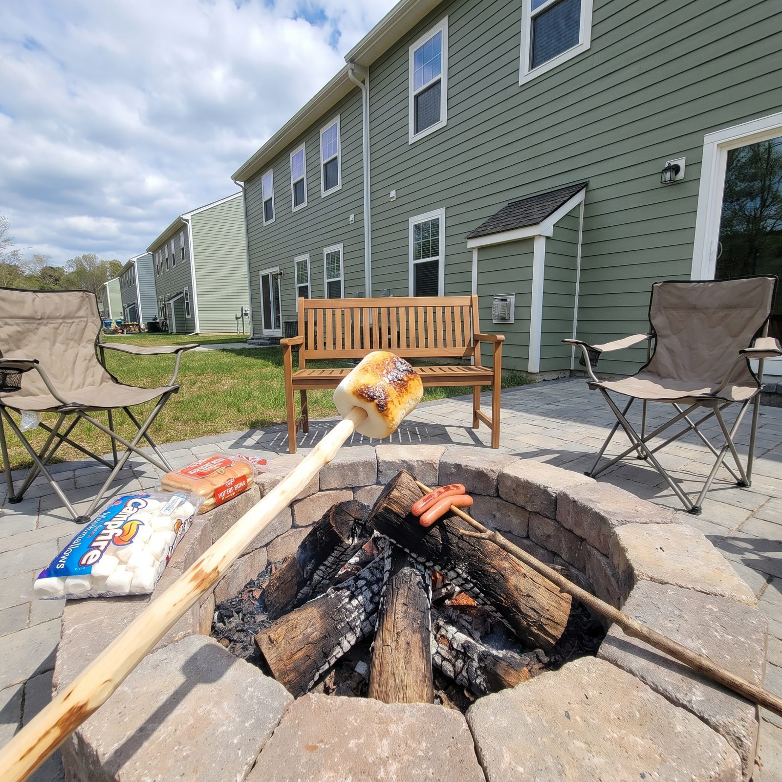 Hot Dogs and Marshmallows Speared on a Sharpened Stick