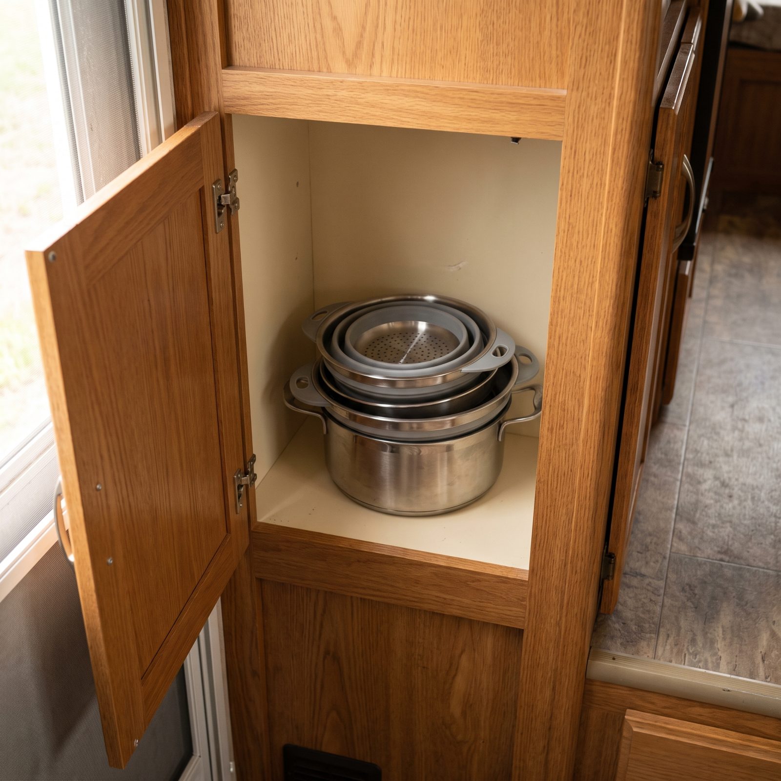 Nest Collapsible Cookware in One Compact Cabinet