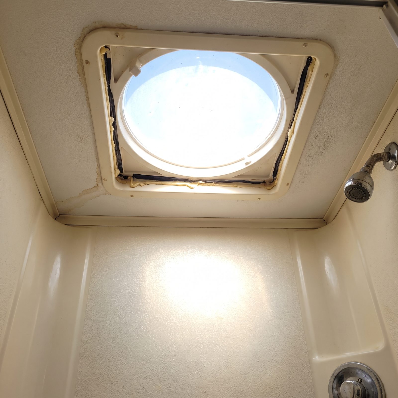 Oversized Shower Skylights That Turn Your Bathroom Into a Magnifying Glass