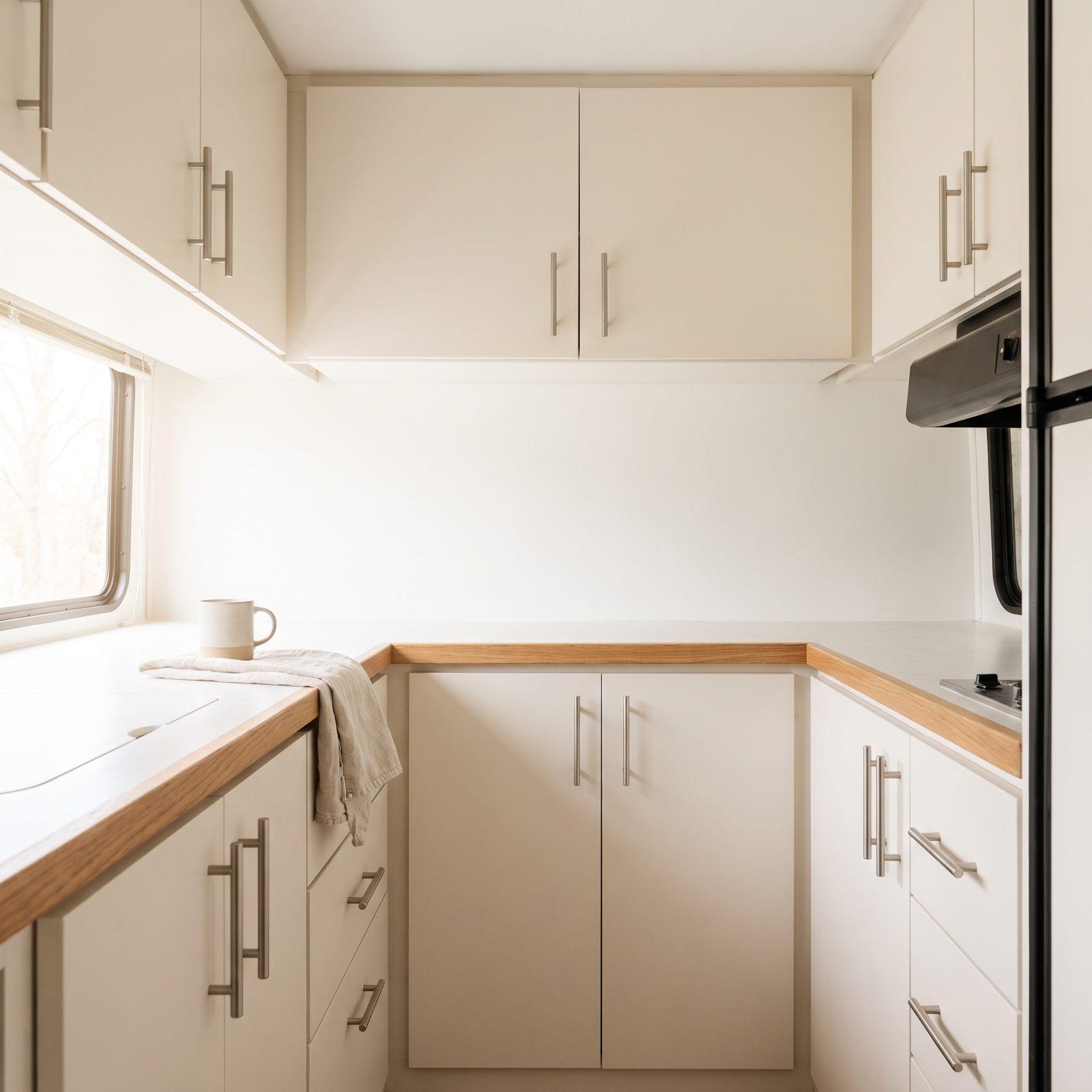 Replace Dark Cabinet Fronts With a Light Matte Finish