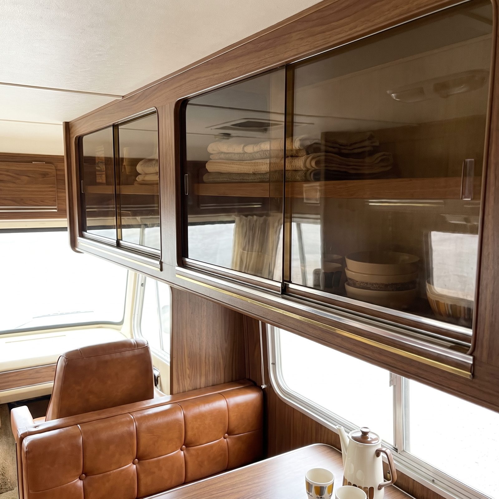 Smoked Acrylic Cabinet Doors With a Rocket-Age Shine