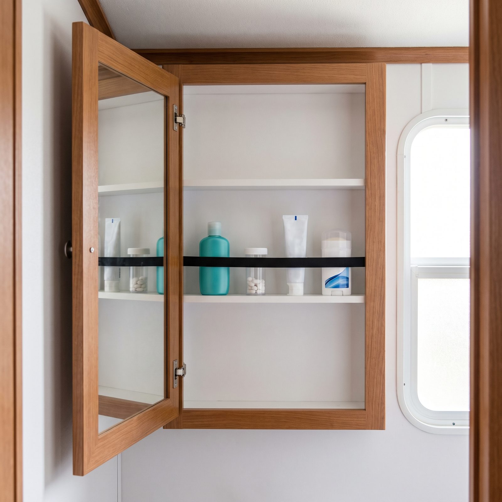 Stretch a Flat Bungee Across the Medicine Cabinet Before Travel