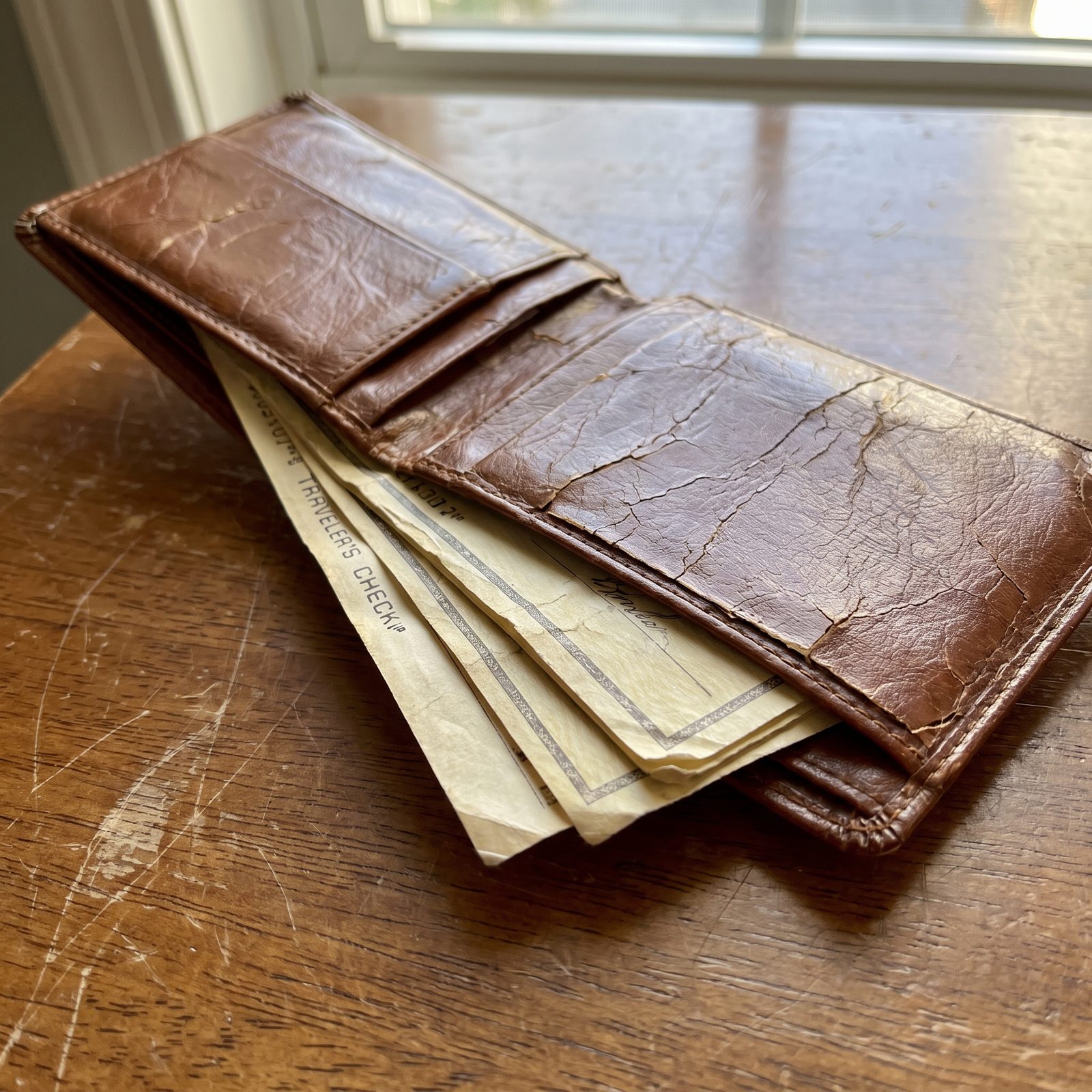 Traveler's Checks Tucked Inside a Vinyl Wallet