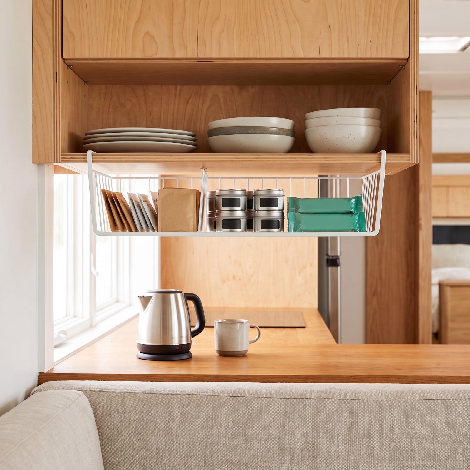 Use Under-Shelf Baskets to Capture Wasted Cabinet Space